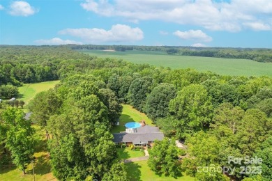 Give This Home a Chance to Wow You! Set on 5+ acres of flat