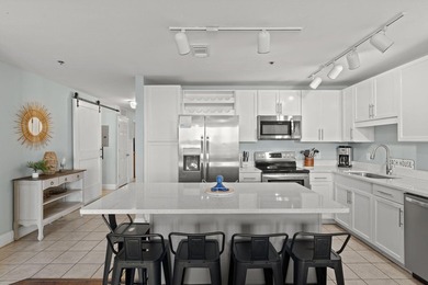 Welcome to this well-kept, updated Laketown Wharf residence - photo 11