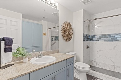 Welcome to this well-kept, updated Laketown Wharf residence - photo 26
