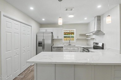 Welcome home to this stunning, fully remodeled residence that - photo 6