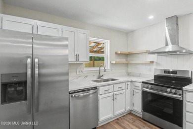 Welcome home to this stunning, fully remodeled residence that - photo 7