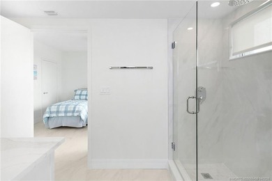 This stunning Oceanfront 3-bedroom, 2.5-bath end unit condo - photo 28