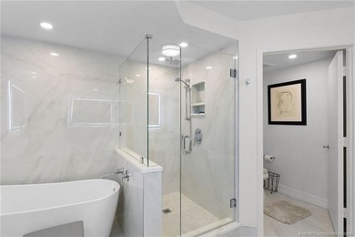 This stunning Oceanfront 3-bedroom, 2.5-bath end unit condo - photo 42