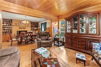 Nestled on nearly 1.5 acres comprised of six city lots, this log - photo 5