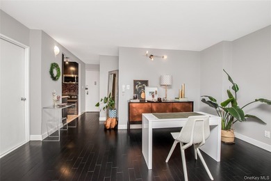 Over-sized one-bedroom condominium with a deeded parking space - photo 1