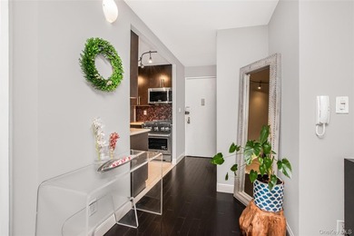 Over-sized one-bedroom condominium with a deeded parking space - photo 9