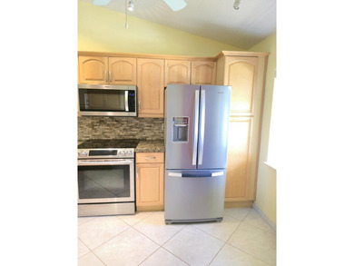 Don't miss this light & bright, spacious, updated CORNER VILLA! - photo 5
