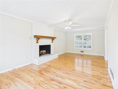 Welcome to 1145 Fieldstone Road, a charming two-story all-brick - photo 3