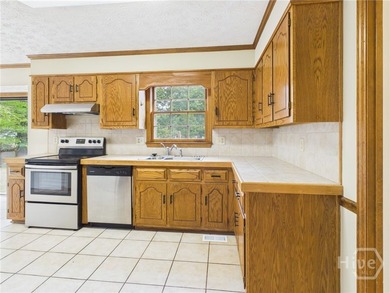 Welcome to 1145 Fieldstone Road, a charming two-story all-brick - photo 4