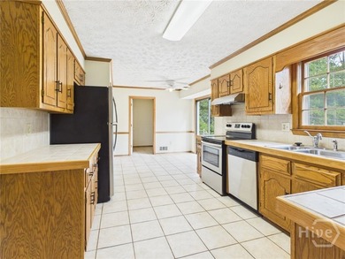 Welcome to 1145 Fieldstone Road, a charming two-story all-brick - photo 5