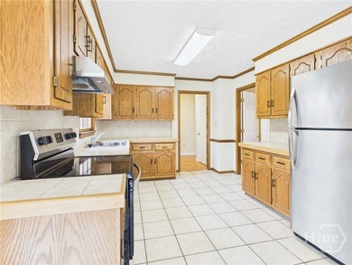 Welcome to 1145 Fieldstone Road, a charming two-story all-brick - photo 6