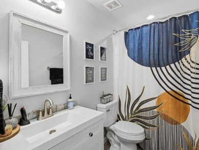 Built in 2021, this 3-bedroom, 2-bath coastal cottage sits on - photo 14