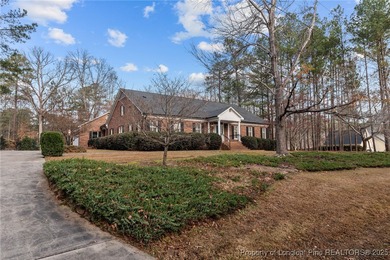 Welcome to this beautifully maintained traditional brick ranch