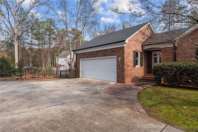 Welcome to this beautifully maintained traditional brick ranch