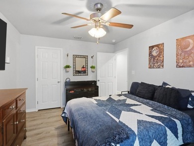 Built in 2021, this 3-bedroom, 2-bath coastal cottage sits on - photo 17