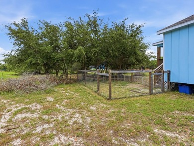 Built in 2021, this 3-bedroom, 2-bath coastal cottage sits on - photo 25