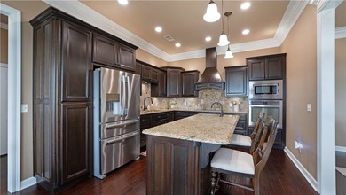 Set inside gated Pleasant View Estates, this 4 bedroom, 3 bath - photo 8