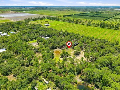 Build your dream oasis on this private, gated 6+ acre heavily - photo 3