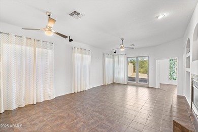 Welcome to this beautifully updated desert oasis featuring new