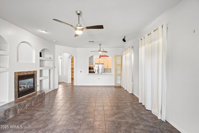 Welcome to this beautifully updated desert oasis featuring new