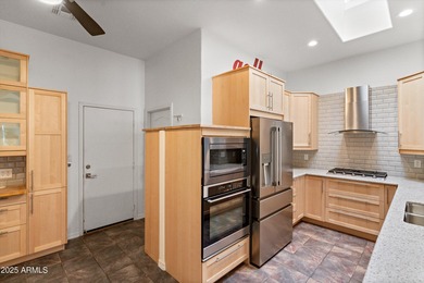 Welcome to this beautifully updated desert oasis featuring new