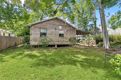 Charming wood cottage with a metal roof and fully fenced yard in - photo 11