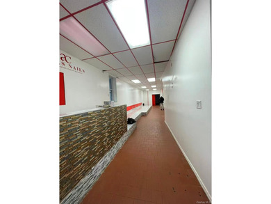 Welcome to 9703 Jamaica Ave, a mixed-use building featuring one - photo 13