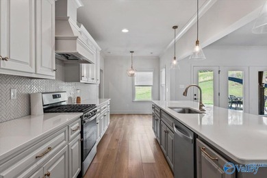 Located on the golf course in Cherokee Ridge, this move-in ready - photo 14