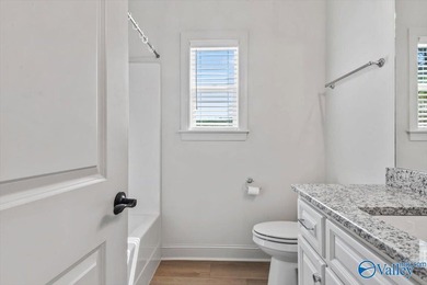 Located on the golf course in Cherokee Ridge, this move-in ready - photo 30