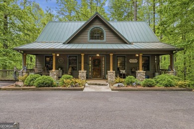 Tucked away in the woods of Sautee Nacoochee, this exceptionally - photo 1