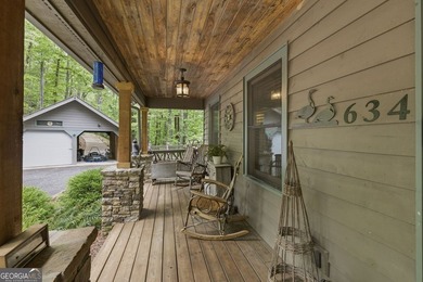 Tucked away in the woods of Sautee Nacoochee, this exceptionally - photo 3