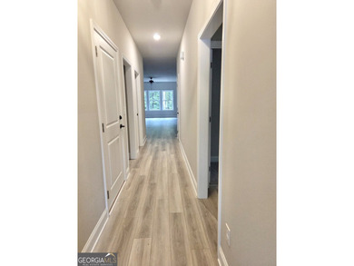 **NEW CONSTRUCTION RANCH PLAN by TIH Homes on a full unfinished - photo 4