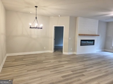 **NEW CONSTRUCTION RANCH PLAN by TIH Homes on a full unfinished - photo 7