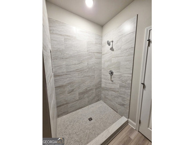 **NEW CONSTRUCTION RANCH PLAN by TIH Homes on a full unfinished - photo 9