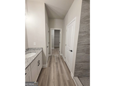 **NEW CONSTRUCTION RANCH PLAN by TIH Homes on a full unfinished - photo 10