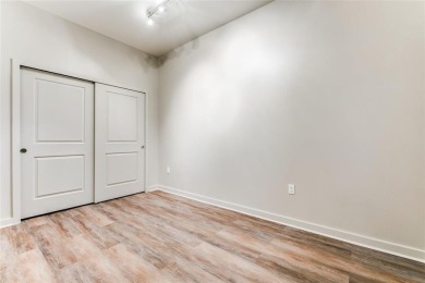 BRAND NEW LUXURY FLOORING IN HOME (color is a darker shade of