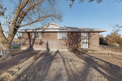 Discover unparalleled potential in this charming 3 Bed/3 Bath