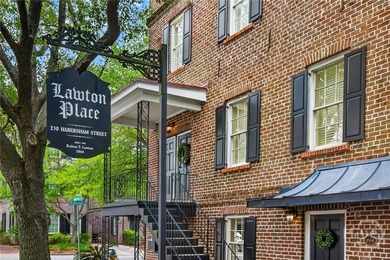 Perched above one of Savannah's most picturesque streets, this - photo 3