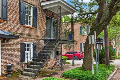Perched above one of Savannah's most picturesque streets, this - photo 4