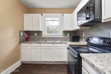 Unlock the potential of this versatile duplex located in a - photo 12