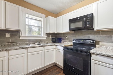 Unlock the potential of this versatile duplex located in a - photo 13