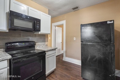 Unlock the potential of this versatile duplex located in a - photo 14