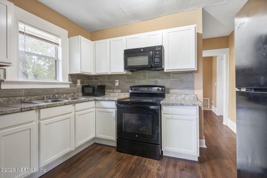 Unlock the potential of this versatile duplex located in a - photo 15