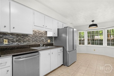 Nestled in the established Kings Grant subdivision, this - photo 3