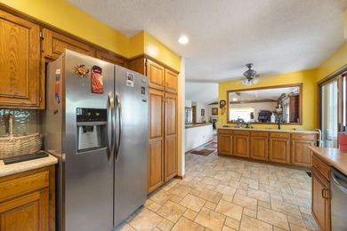 Well maintained home with limited view of Kingswood golf course - photo 9