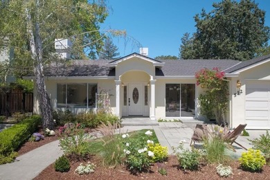 Situated on a picturesque tree-lined street and located down a - photo 1