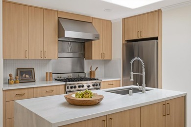 Situated on a picturesque tree-lined street and located down a - photo 9