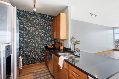 Soak in the energy of downtown living from this spacious - photo 4