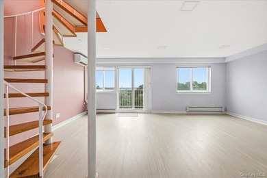 Duplex Penthouse Condo with Outdoor Space and Deeded Parking in - photo 11