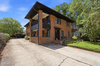 Rare opportunity to own a beautifully renovated duplex in the - photo 1